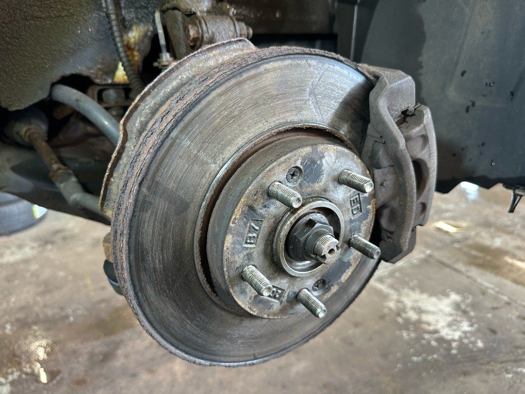 Worn brake disc before pads and discs are replaced at Bankside MOT & Repair